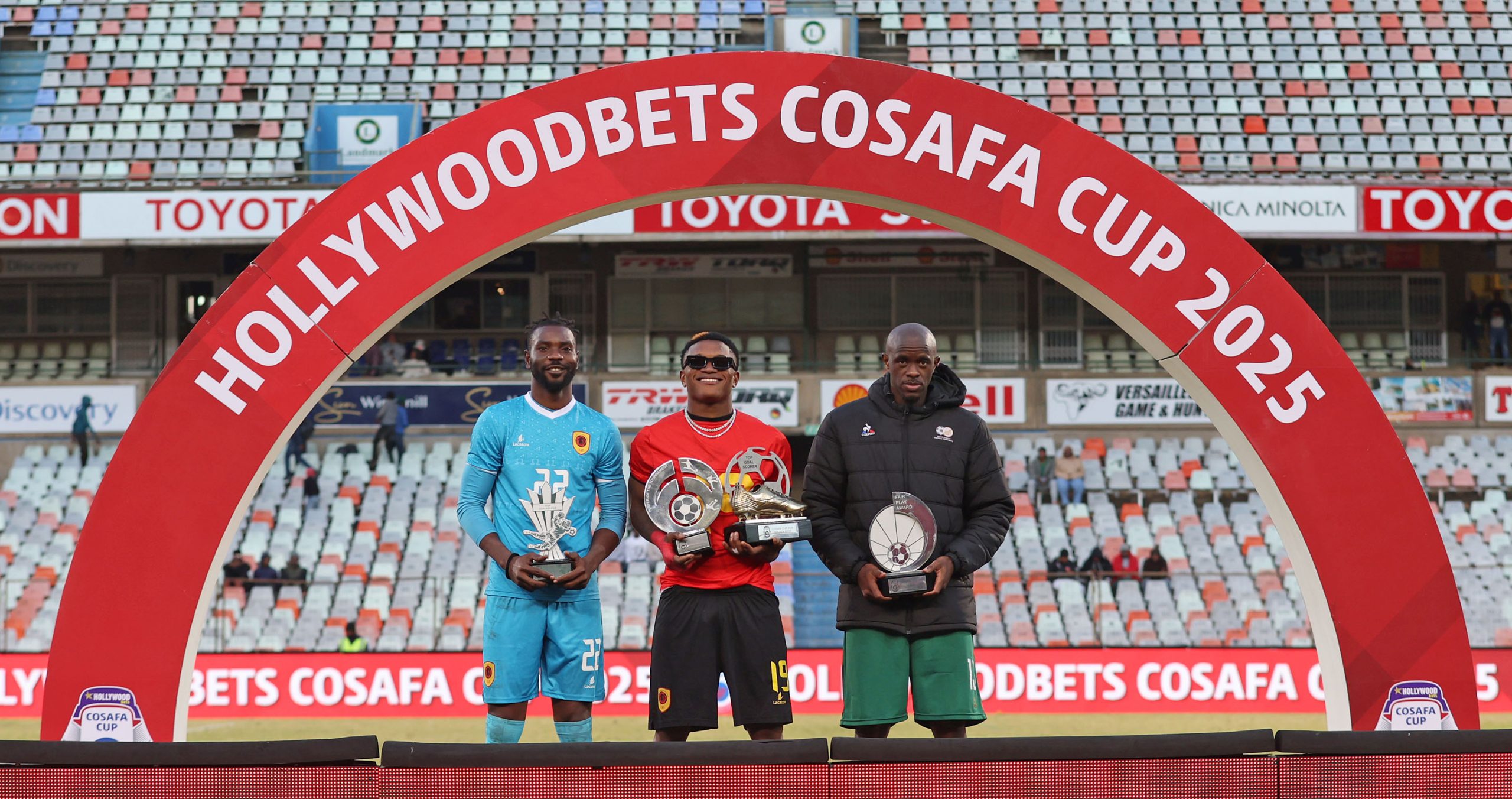 Adilson Da Cruz Cipriano of Angola (Goalkeeper of the tournament), Laurindo Aurelio of Angola (Top goal scorer of the tournament and player of the tournament) Kwanda Mngonyama of South Africa receives fair play award during the 2025 HollywoodBets COSAFA Cup Final match between Angola and South Africa at the Free State Stadium, Bloemfontein on the 15 June 2025 ©Muzi Ntombela/BackpagePix